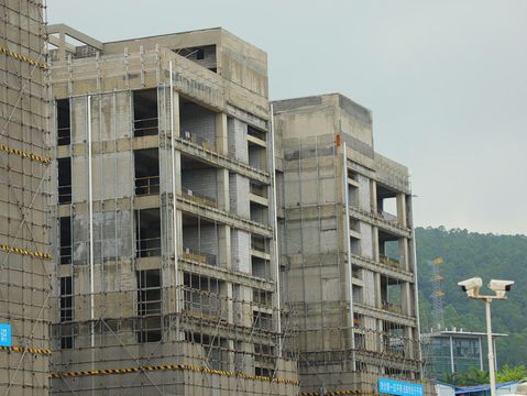 烂尾楼工程纠纷怎么处理，违建烂尾楼可以收购吗