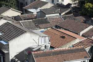 不是本村居民取得宅基地怎么处理