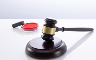 如何根据法律规定对伪造企业印章罪进行裁量